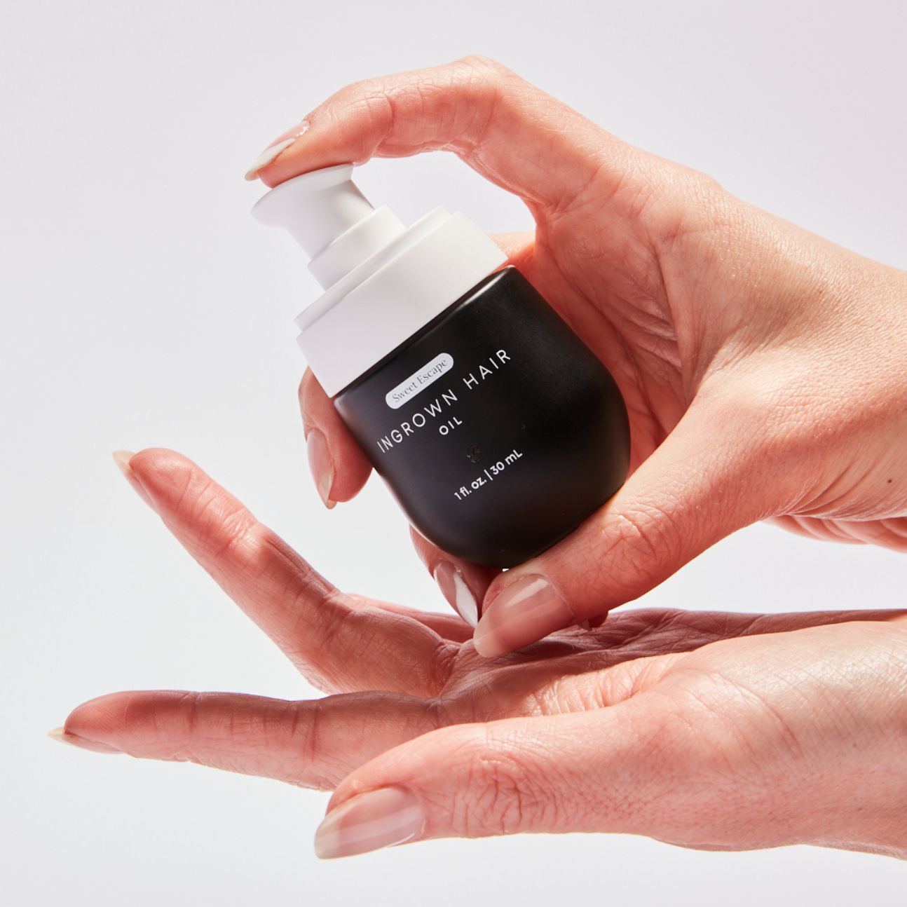Hand pumping out bushbalm oil